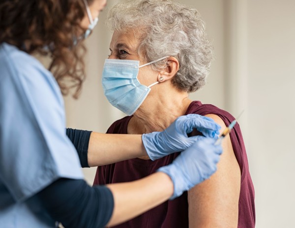 Senior citizen having covid vaccine 